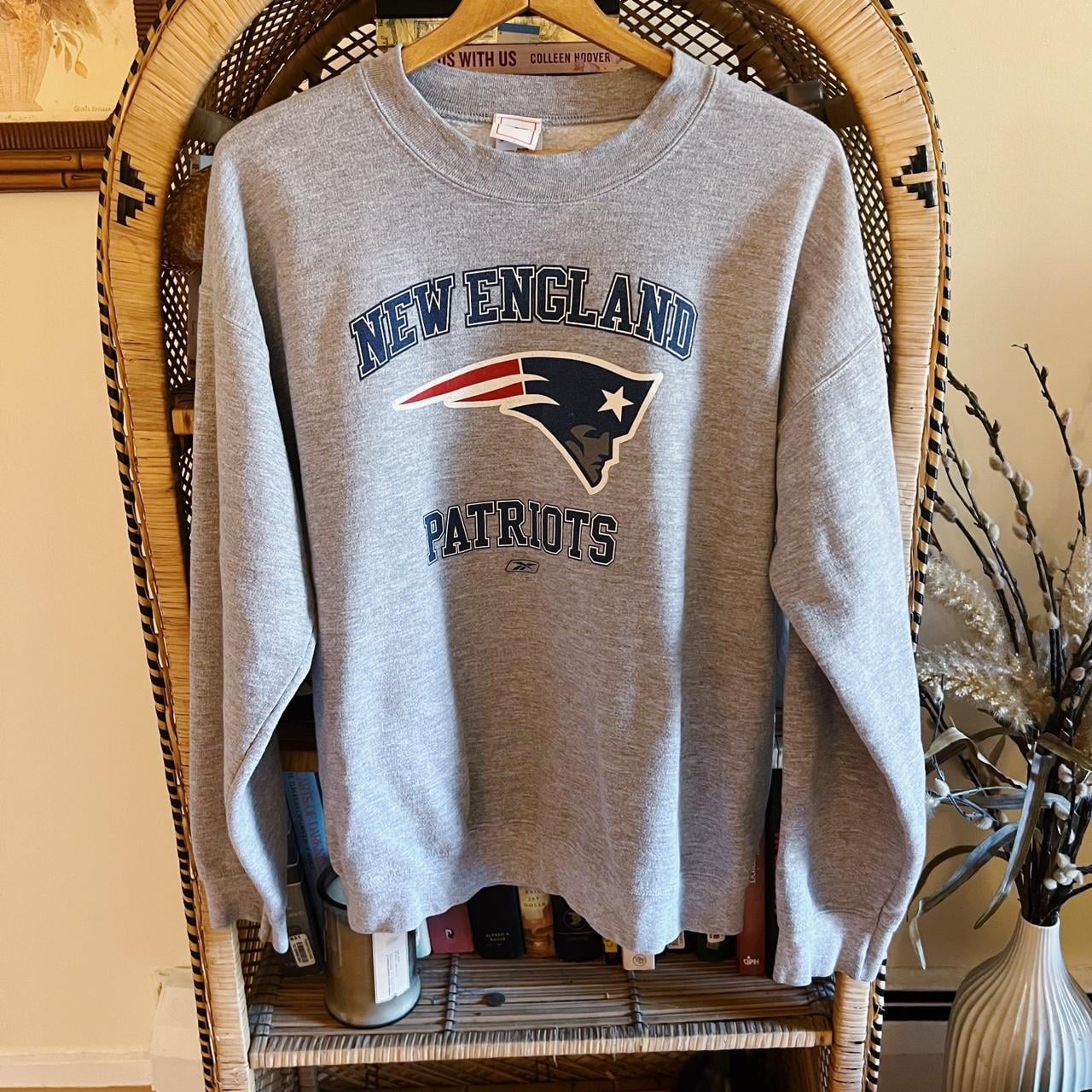 Layering a Patriots crewneck for a polished look